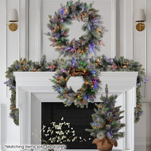 National Tree Company 61cm Pre-Lit Snowy Stamford Spruce Battery-Operated Mini Christmas Tree Multi-Functional LED Timer - Santas Workshop Direct 