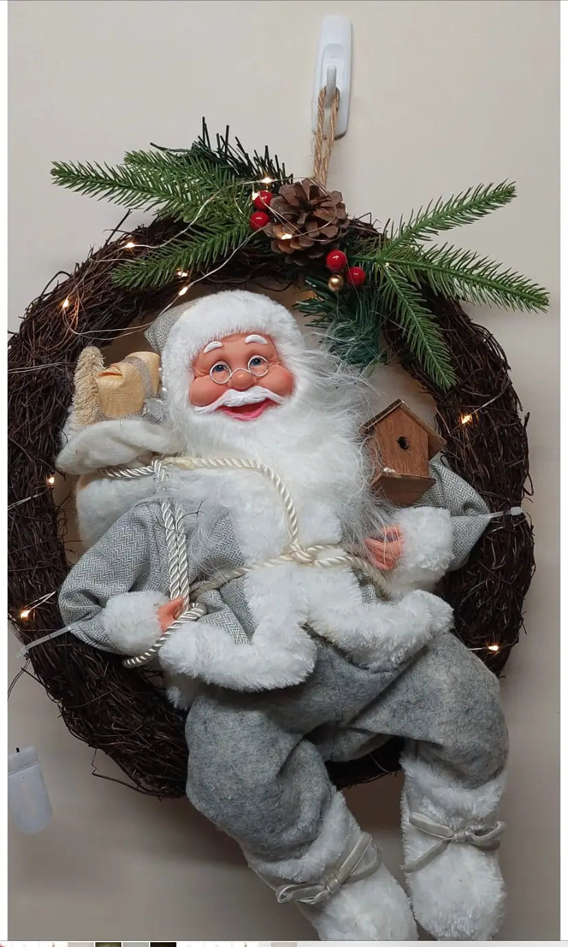 Hanging Christmas Wreath Garland with sitting  Santa Figure Santa LED lights 37w x48h cm Santas Workshop Direct
